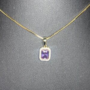 Gold Pendant Necklace with Purple Gemstone
